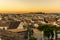 A view northward across the rooftops of Antequera, Spain at sunset