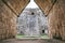 View from nunnery gate to the pyramid of magician, The ancient of mayan ruins in uxmal, Yucantan, Mexico