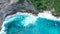 View of Nusa Penida cliffs with bautiful blue sea taken by drone
