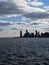 View of NY Harbor with distant skyline of NYC lower Manhattan