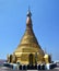 View o the majestic golden stupa on the top of mount Zwegabin, H