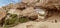 View of the oasis of the Namibe Desert, through the arch. Angola. Africa