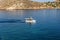 View of the ocean with boat of the Greek island of Ios island, C