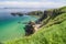 View of the ocean and Carrick-a-Rede island on the coast of County Antrim, Northern Ireland