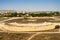 A view of Odeon amphitheatre from the hill in Paphos Archaeological Park, Cyprus