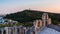 View of Odeon of Herodes Atticus theater on Acropolis hill, Athens, Greece, overlooking the city and hill of Muses or Philpppapou