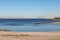 View at off shore wind turbine farm from beach Urk