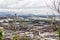 View of oil refinery and petrochemical plant with background cloudy sky and mountain in evening day at thailand