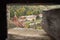 View of the old Bran city through the slaughterhouse in the watchtower of Bran Castle. Bran city in Romania