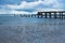 View of the old broken fishing docks at Hua Hin Beach Prachuab K