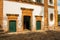 View of old colored church doors and cobblestone street in Paraty.