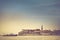 View of the old fort and the ship floating on the sea. Budva, Montenegro.