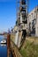 View on old historic cranes at inland loading port landing pier on rhine river