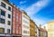 View on old houses in downtown Munich with theatiner Church in the back, Germany