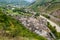 View of old italian town Aosta with sky covering clouds.