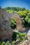 View of the Old Kalogeriko triple arched stone bridge