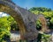 View of the Old Kalogeriko triple arched stone bridge