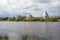 View of the Old Ladoga fortress from the right bank of the Volkhov river, cloud day. Leningrad region, Russia