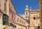 A view of old Mdina street with Carmelite Church Bell Tower on t