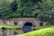 A view an old medieval bridge and weir on the outskirts of Ripon, Yorkshire, UK