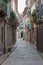 View at a old and narrow street with classic buildings on downtown Guimaraes city