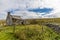 A view of an old ruined farmhouse on the Dales near Hawes, Yorkshire, UK