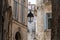 View on old streets and houses in ancient french town Arles, touristic destination with Roman ruines, Bouches-du-Rhone, France