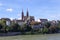 View of the Old Town of Basel with red stone Munster cathedral and the Rhine river