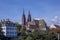 View of the Old Town of Basel with red stone Munster cathedral and the Rhine river