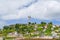 View of the old town of Quito, Ecuador with rolling hills