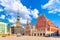 View of the Old Town Ratslaukums square, Roland Statue, The Blackheads House and St Peters Cathedral against blue sky in Riga,