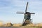 View on an old tradional windmill in the Netherlands, part of historic Dutch culture