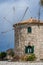 View of the old windmill in Skinari Cape