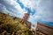 View of an old windmill at the Trapani salt museum on a cloudy day