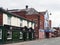 A view of oldham road in ashton under lyne showing the derelict tameside hippodrome and market tavern pub