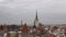 View of the Oleviste Church in old Tallinn, cloudy March day. Estonia