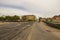 View on one of central streets in Uppsala, Sweden, Europe. Small bridge over river , yellow buildings, red castle far away