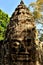 View of one face of the magnificent entrance to the complex of Angkor Thom