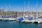 View of the One Ocean Port Vell Barcelona with many beautiful moored yachts. Barcelona, Spain - May 2 2016.