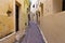 View of the one of the old streets in the Tangier Medina quarter in Northern Morocco. A medina is typically walled, with many