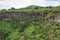 View of one of the twin volcanic craters in the highlands of Santa Cruz