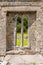 A view of one of the windows of the abanoned ruins of Killone Abbey that was built in 1190 and sits on the banks of the Killone