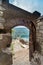 View through an open ancient doorway of the Fortress,overlooking the Bay of Kotor,Montenegro