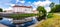 View of Oranienburg Castle with the banks of the river Havel in the foreground