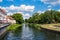 View of Oranienburg Castle with the banks of the river Havel in the foreground