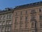 View of the ornate facades of old buildings in the downtown of city Vienna, capital of Austria, Europe in the evening.