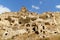 View of Ortahisar castle and cave houses. Cappadocia. Turkey