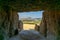 View out of the entrance of the Dolmen de Menga in Antequera