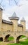 View of Outer wall and towers of Carcassonne fortification. France