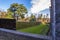 View of the outside wall, moat and park of Castello Sforzesco Sforza Castle in Milan, Italy